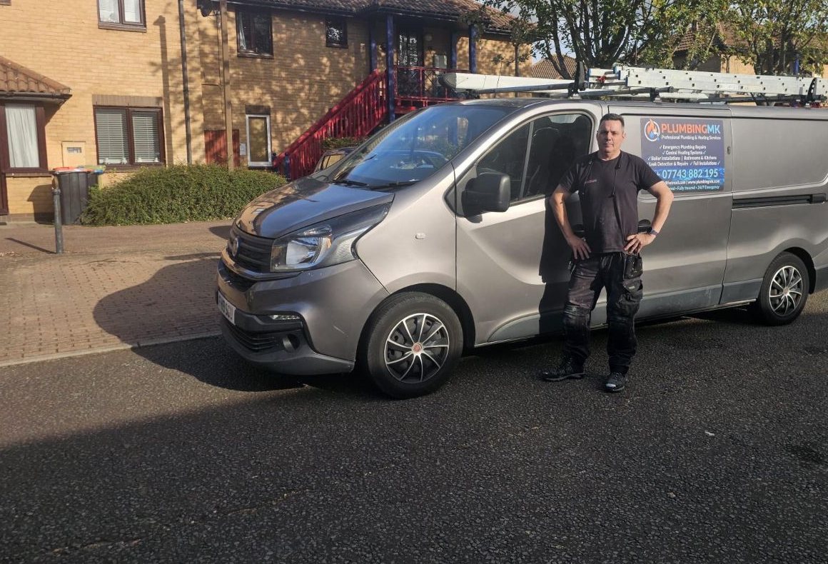 Martin from Plumbing MK standing in front of his Plumbing MK van in Milton Keynes